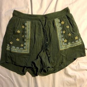 Green embroidered shorts